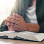 Bible,,Prayer,Hands,And,Person,Reading,Book,In,Spiritual,Religion