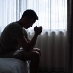 When Your Faith Needs Stability, Not Speed: A Biblical Path to Steadfast Growth and Spiritual Maturity Thoughtful,Man,In,A,Dark,Room,With,Head,Down,,Portrait