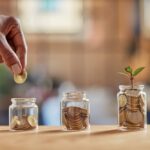 Building Financial Stability Without Losing Your Soul: A Biblical Guide to Wealth, Wisdom, and Eternal Purpose Close,Up,Of,Black,Woman,Hand,Adding,Money,In,Coin