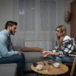 When Arguments Rise but Commitment Stays Young,Married,Couple,Husband,And,Wife,Sitting,At,Home,Having