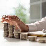 Young,Asian,Woman,Making,Stack,Of,Coin.,Invest,Save,Finance