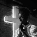 When God Is Your Only Certainty African,American,Woman,Praying,With,Eyes,Closed,,Hands,Clasped,In