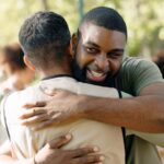 Happy,Man,,Friends,And,Volunteer,With,Hug,In,Nature,For